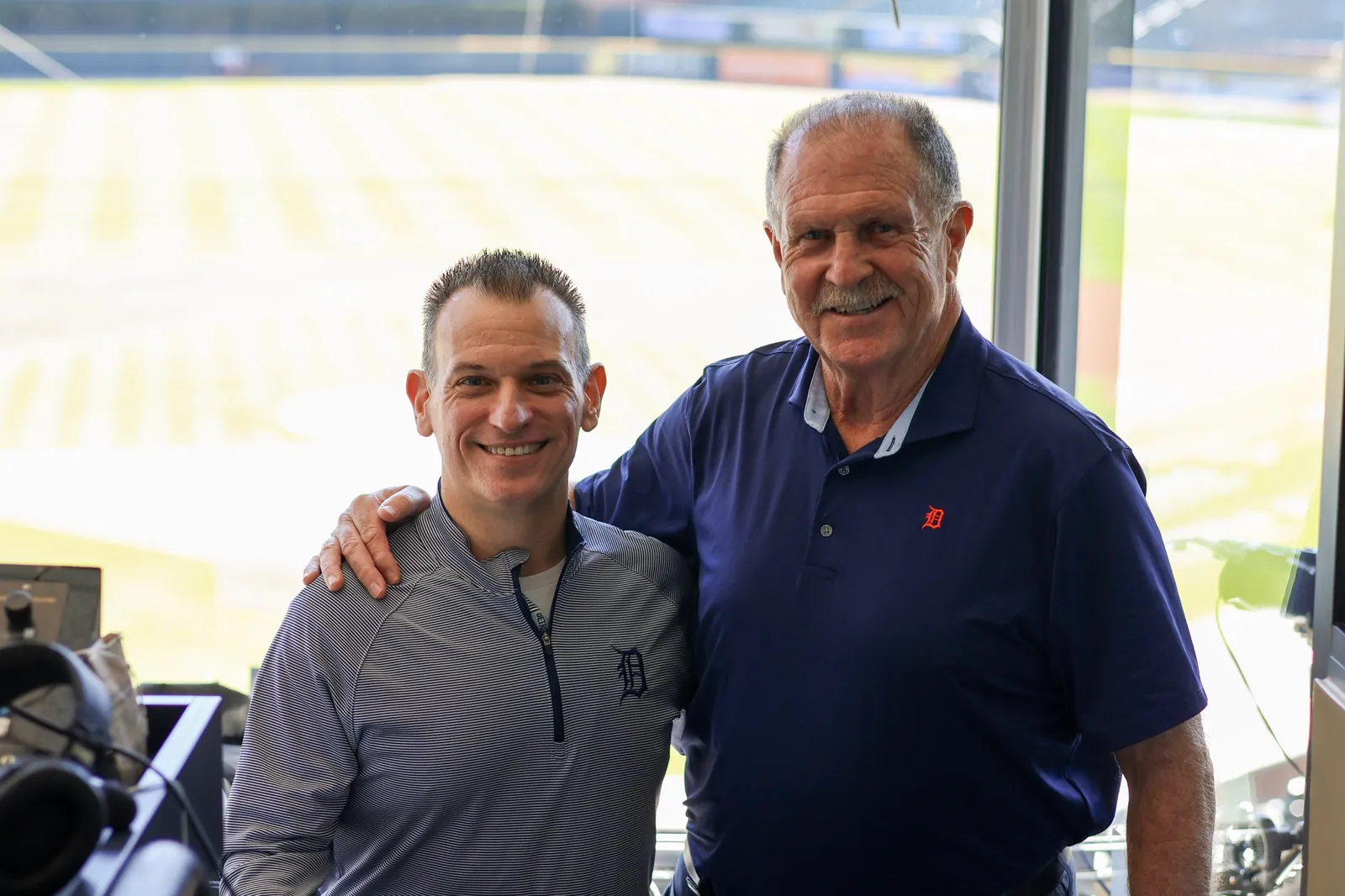 Greg Gania with a fellow Tigers broadcaster in the booth at Comerica Park